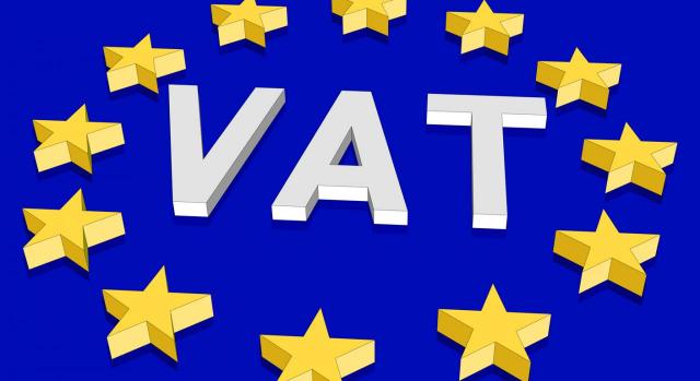 La implantación del paquete ViDA (VAT in the Digital Age) es una de las medidas que se recogen en el Plan Estratégico de la AEAT 2024-2027. La palabra VAT en el centro de la bandera de la Unión Europea
